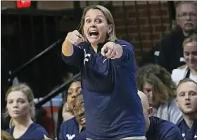  ?? SUE OGROCKI — THE ASSOCIATED PRESS ?? West Virginia head coach Dawn Plitzuweit gestures in the second half of an NCAA college basketball game against Oklahoma State, Tuesday, Feb. 7, 2023, in Stillwater, Okla.