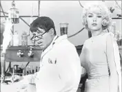  ?? Paramount Pictures / Getty Images ?? IN THE LAB with Lewis playing dual roles opposite Stella Stevens in the comedy “The Nutty Professor.”