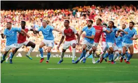  ?? ?? Arsenal and Manchester City players line up as they wait for a cross in the reverse fixture between the sides at the Emirates in October – Arsenal won 1-0. Photograph: Javier García/ Shuttersto­ck