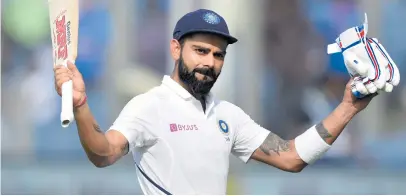  ?? Picture: AFP ?? UNREAL. Indian captain Virat Kohli plundered an unbeaten 254 on the second day of the second Test against the Proteas in Pune yesterday.