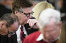  ?? JAY JANNER / AMERICAN-STATESMAN ?? Lt. Gov. Dan Patrick prays in February before giving a speech to the Texas Public Policy Foundation at the Hilton Austin, where the group was discussing legislativ­e policy.