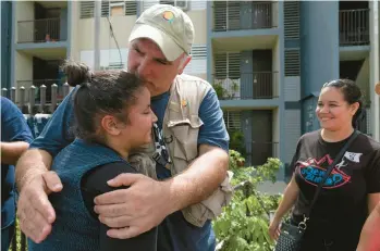  ?? ERIC ROJAS/THE NEW YORK TIMES ?? José Andrés, the Spanish chef who founded World Central Kitchen, visits Puerto Rico after Hurricane Maria in 2017. This week, several of his workers died in Gaza.“I am heartbroke­n and grieving,”Andrés said.