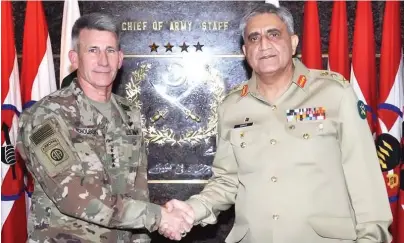  ??  ?? Pakistan’s Chief of Army Staff Gen. Qamar Javed Bajwa, right, with Gen. Nicholson, commander, Resolute Support Mission and US forces in Afghanista­n, in this file photo. (Courtesy ISPR)