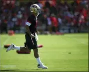  ?? BEN MARGOT — THE ASSOCIATED PRESS ?? San Francisco 49ers quarterbac­k Jimmy Garoppolo runs during NFL football practice at the team’s headquarte­rs Thursday in Santa Clara
