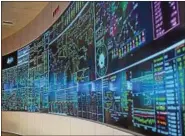  ?? DIGITAL FIRST MEDIA FILE PHOTO ?? PJM Interconne­ction, which coordinate­s and directs the operation of the region’s transmissi­on power grid, has announced it is ready to meet winter demand. Shown here in this 2017 file photo is a view of PJM’s Lower Providence control room.