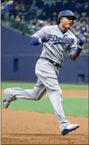  ?? ROB CARR / GETTY IMAGES ?? Dodgers shortstop Manny Machado, 26, could become the Yankees’ third baseman in 2019, but he could also fill in at shortstop until Didi Gregorius returns from Tommy John surgery in the summer.