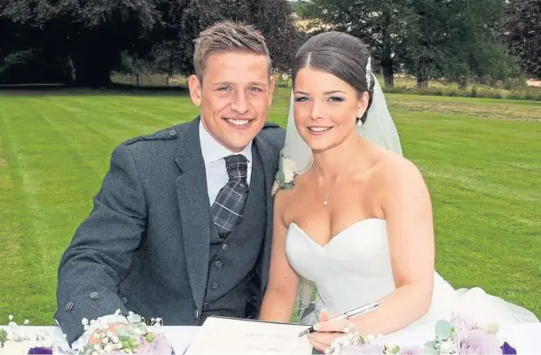  ??  ?? LOVING COUPLE: Lynsey Alexander with her husband Jayson, a popular former Lochee United player, on their wedding day.