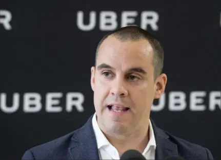  ?? RYAN REMIORZ, THE CANADIAN PRESS ?? Jean-Nicolas Guillemett­e, Uber Quebec’s general manager, speaks at a news conference in Montreal on Tuesday. The ride-hailing company says it will cease operating in Quebec next month if the province doesn’t rescind new rules introduced last week.