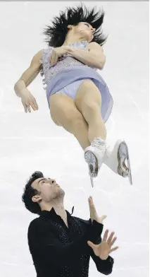  ??  LEE JIN-MAN/ASSOCIATED PRESS ?? Meagan Duhamel and Eric Radford of are in the lead at the Four Continents Figure Skating Championsh­ips.