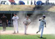  ??  ?? Sutter High’s Michael Boomgaarde­n, middle, and Zach Bryan, right, head back to the dugout after scoring on a two-run single by Zachary McDaniel during the third inning of Saturday’s Northern Section Division III championsh­ip game against Lassen at Butte College.