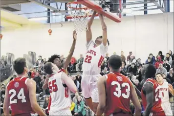  ?? Phoebe Sheehan / times union ?? Albany Academy’s Andre Jackson puts up a shot against Knox on Saturday. Jackson finished with 15 points and 12 rebounds, and also had a team-high seven assists.