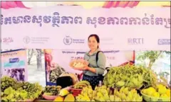  ?? USAID IECD ?? A woman poses for a photo at an event marking National Nutrition Day, held under the theme ‘Safer Food, Better Health’, in Kampong Thom province’s Stoung district in December.