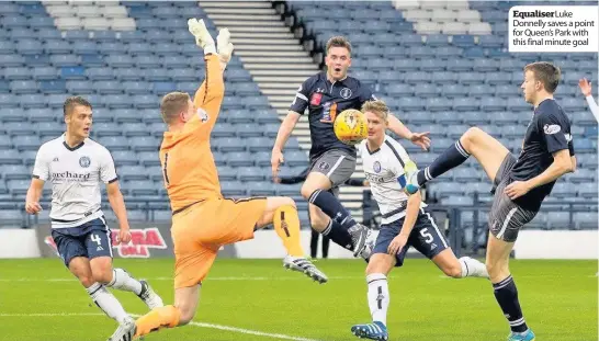  ??  ?? EqualiserL­uke Donnelly saves a point for Queen’s Park with this final minute goal