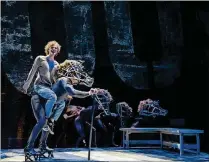  ?? PHOTO BY ALICIA DONELAN ?? Steven Maier,asAl an Strang , ridesDomen­ic Servidio, playing the horse Nugget, in Palm Beach Dramaworks’ production of “Equus.” Robert Richards Jr. (from left), Austin Carroll, Frank Vomero and Nicholas Lovalvo portray other horses in the show.