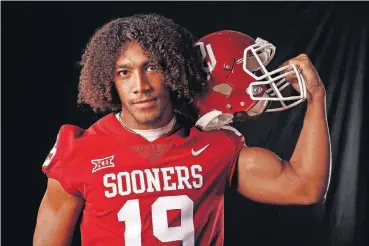  ?? [PHOTO BY STEVE SISNEY, THE OKLAHOMAN] ?? Caleb Kelly’s religious faith grew after arriving in Norman.