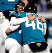  ?? DOUGLAS P. DEFELICE/GETTY IMAGES ?? CLINCHING KICK: Riley Patterson’s lastsecond field goal sealed an improbable wild-card comeback for the Jaguars. C4