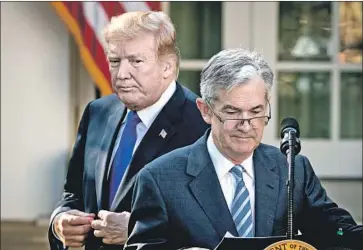  ?? Drew Angerer Getty Images ?? PRESIDENT TRUMP at the November 2017 announceme­nt of Jerome Powell as his nominee for chairman of the Federal Reserve. Trump is critical of the Fed’s interest rate increases but said he wouldn’t fire Powell.