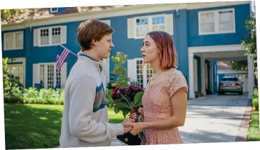  ??  ?? Coming of age: Lady Bird (Saoirse Ronan) and Danny (Lucas Hedges) in a touching scene