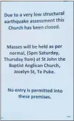  ??  ?? The sign on the door at St Patrick’s Catholic Church in Te Puke.