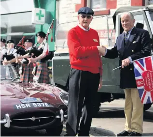  ??  ?? Vintage vehicles Colin Stewart, with Brigadier Mel Jameson at a previous Drive-It Day. Pic: Clare Damodaran