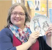  ??  ?? Pictured is Rebecca Hubert, with her signed plate.