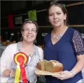  ??  ?? Margaret Levingston­e from Enniscorth­y who won 1st place for wholemeal bread on her first attempt, pictured with Marie McCormack