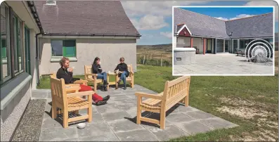  ??  ?? Visitors enjoy a coffee break at Kildonan Museum and cafe on South Uist.