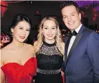  ??  ?? Flanked by emcees Lisa Wu andTodd Talbot, Ana Tsybulnyk shared with attendees at the Time To Shine gala the life-saving care she received following a motor vehicle accident.