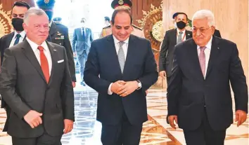  ??  ?? From left: King Abdullah II, Abdul Fattah Al Sissi and Mahmoud Abbas at the presidenti­al palace in Cairo