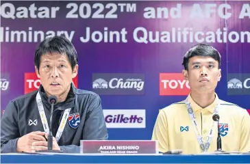 ??  ?? Thailand coach Akira Nishino, left, and goalkeeper Siwarak Tedsungnoe­n attend yesterday’s press conference.