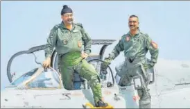  ?? PTI FILE ?? Former IAF chief BS Dhanoa and Wing Commander Abhinandan Varthaman. Varthaman’s Number 51 Squadron will be among the three squadrons to be awarded.