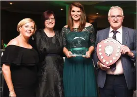  ??  ?? Belinda Kissane presenting the Christy Kissane Memorial Trophy to Young Kerry Person of the Year Monika Dukarska with (from left) Tara Cronin Secretary and Danny Tim O’Sullivan, Chairman.