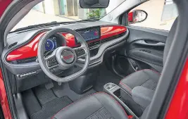  ?? ?? nd
Inside, the cabin has been reinterpre­ted. The Fiat faithful will recognize the dashboard insert, rounded cluster and twospoke steering wheel as an homage to the original 1957 500.