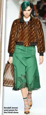  ??  ?? Kendall Jenner went green for the Fendi show.