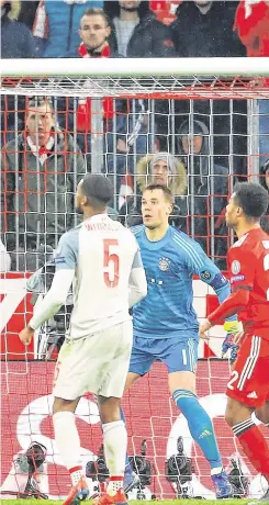  ??  ?? High rise:Virgil Van Dijk leaps above the Bayern Munich defence to score Liverpool’s second goal and put them in front in last night’s Champions League victory