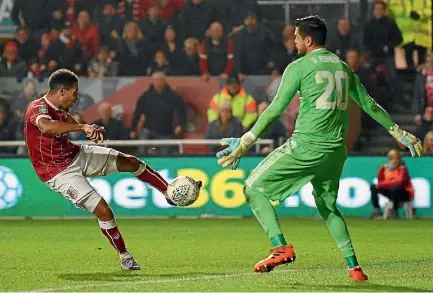  ?? PHOTO: GETTY IMAGES ?? Bristol City’s Korey Smith scores his dramatic injury-time winner against Manchester United in the League Cup.