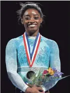  ?? WINSLOW TOWNSON/USA TODAY SPORTS ?? Simone Biles pointedly wore a teal-colored leotard Sunday.