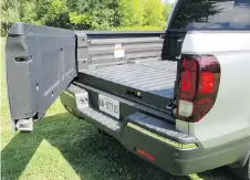  ?? JIL McINTOSH/DRIVING ?? The Honda Ridgeline features a tailgate that can be opened two ways and a lockable sealed trunk space under the bed.