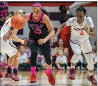  ?? AP/DON PETERSON ?? Louisville guard Asia Durr (25) scored 34 points to lead the No. 2 Cardinals to a 72-63 victory over Virginia Tech.
