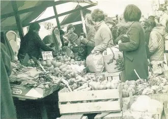  ??  ?? Pictured are customers in Loughborou­gh Market in 1969. Photo sent in by Looking Back reader Roger Boon.