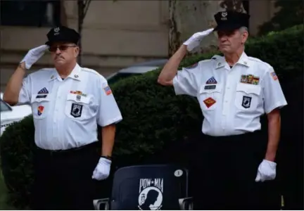  ?? MARIAN DENNIS — DIGITAL FIRST MEDIA ?? Montgomery County Commission­ers held a ceremony Friday observing POW/MIA day. The event, held outside the Montgomery County courthouse served as a reminder of those who saw action and never returned home.