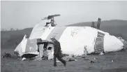  ??  ?? The wrecked nose section of the Pan-am Boeing 747 in Lockerbie