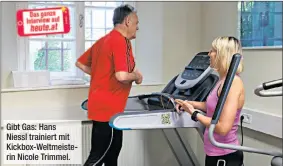  ??  ?? Gibt Gas: Hans Niessl trainiert mit Kickbox-Weltmeiste­rin Nicole Trimmel.