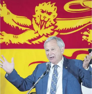  ?? ANDREW VAUGHAN / THE CANADIAN PRESS ?? New Brunswick PC Leader Blaine Higgs addresses supporters at his campaign office in Quispamsis, N.B., on Monday.