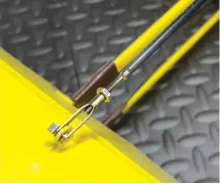  ??  ?? You can use a clevis for certain applicatio­ns. Here, you see the aileron connector rod attached to the top surface of the biplane’s bottom aileron.