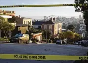  ?? AP ?? Police tape blocks a street outside the home of Paul Pelosi, the husband of House Speaker Nancy Pelosi, in San Francisco, on Friday after Paul was attacked and severely beaten by an assailant with a hammer.