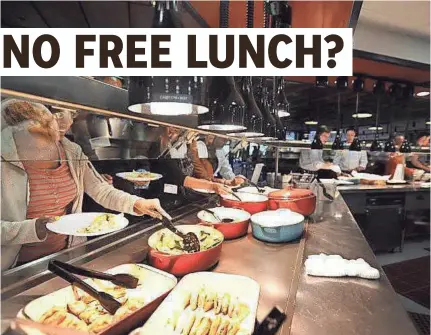  ?? JESSICA BRANDI LIFLAND ?? Facebook offers a typical tech company perk for its employees: free food in lavish cafeterias. But new rules may curtail the popular practice.