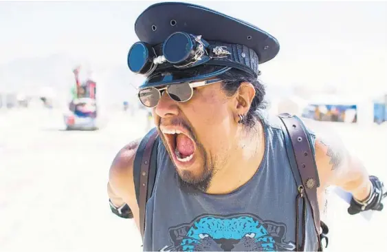  ??  ?? A lack of diversity at the event drew Erin Douglas back to document the people of color at Burning Man 2018.