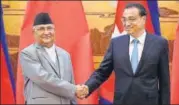  ?? REUTERS ?? Nepal's KP Sharma Oli with China’s Li Keqiang.