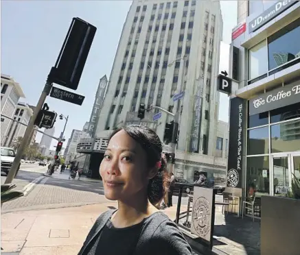  ?? Luis Sinco Los Angeles Times ?? KRYS LEE visits L.A.’s Koreatown, where her Christian pastor father once preached. She has mixed feelings about her past here.